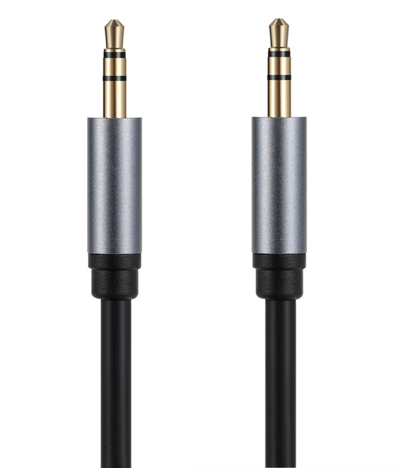 Close-up of 3.5mm male stereo audio connectors with gold-plated contacts