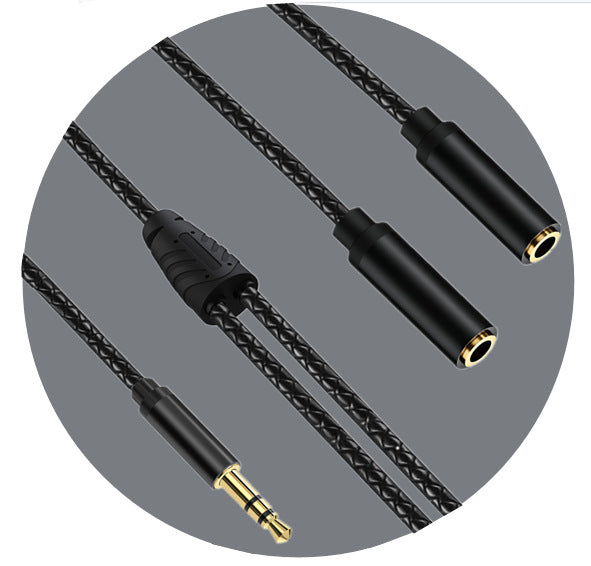 Black braided audio cable with a 3.5mm jack, a 2.5mm jack, and a 3.5mm to 2.5mm adapter, shown on a gray circular background.