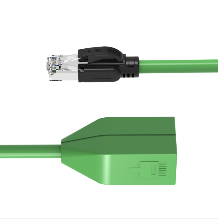 Close-up of female straight inline housing and shielded RJ45 male connector on green PROFINET cable