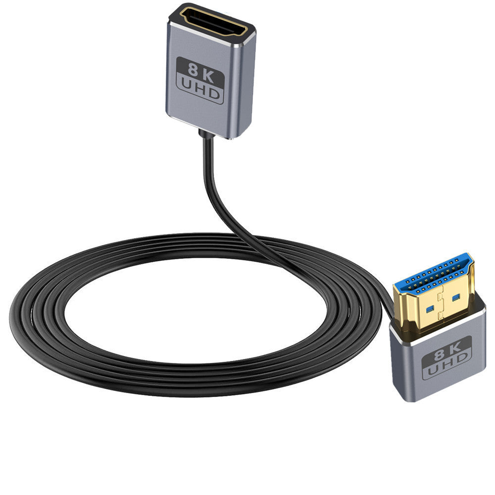 An ultra thin HDMI 2.1 coaxial extension cable with a male to female up angle connector on one end and a blue and yellow connector on the other end.