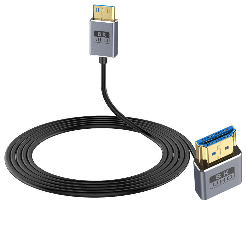 A black mini HDMI to HDMI 2.1 coaxial cable with double layer shielding, shown with one end being mini HDMI and the other end being standard HDMI.