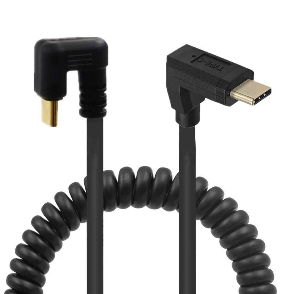Black coiled cable with right-angle connectors on a white background