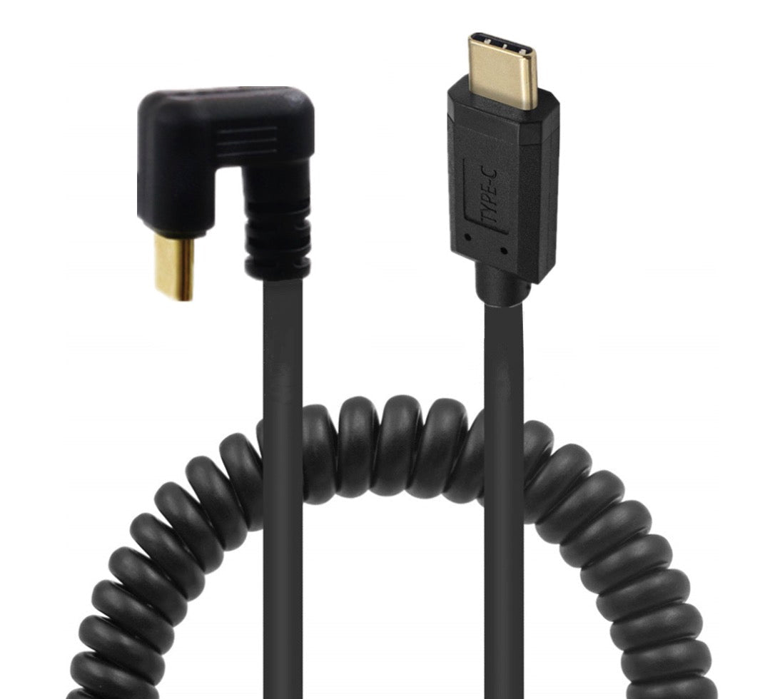 Coiled USB-C cable with angled connector on a white background