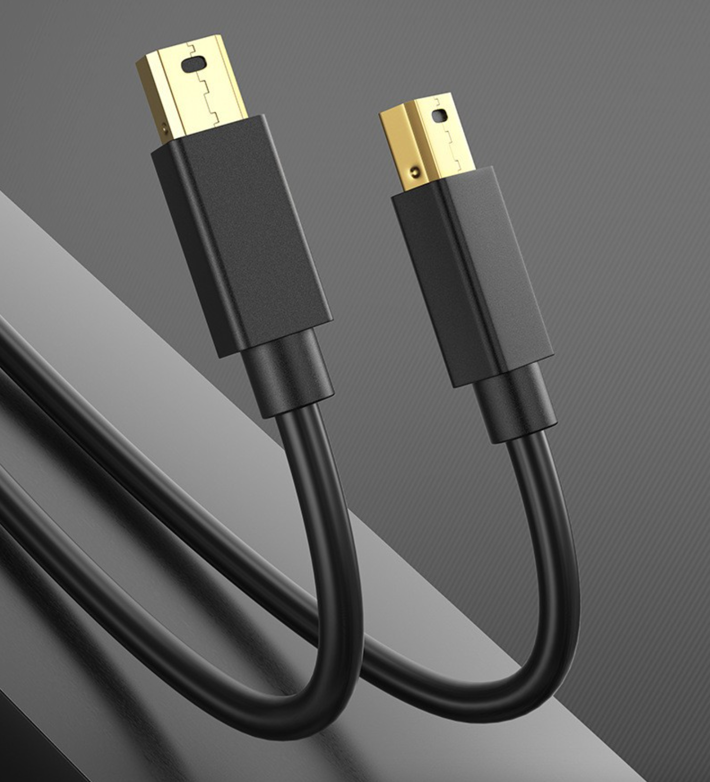 HDMI cable with gold connectors on a gray background