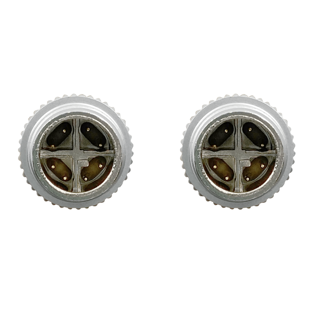 Two gray wheels with a central hub on a white background