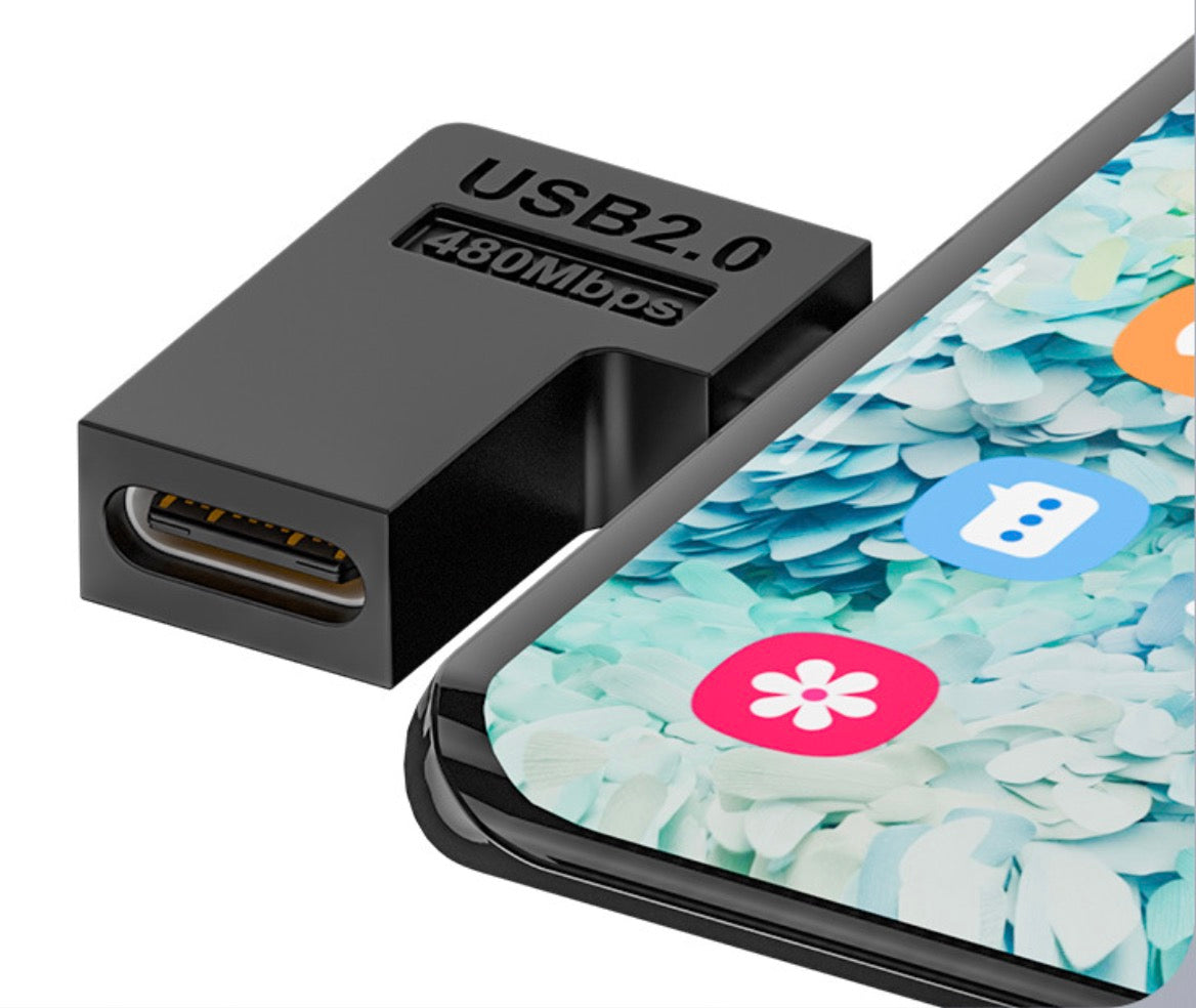 Micro USB to USB C left angle adapter connected to a compatible mobile device