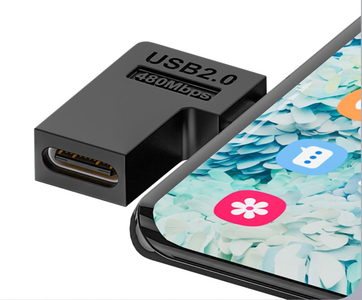 Micro USB to USB C right angle adapter connected to a compatible mobile device