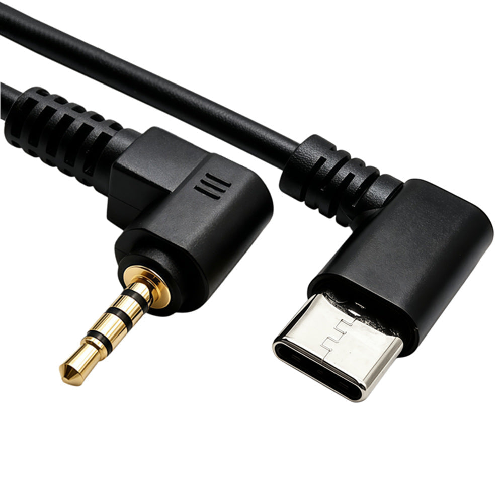 Close-up of USB-C and 3.5mm 4-pole connectors on a DAC audio cable