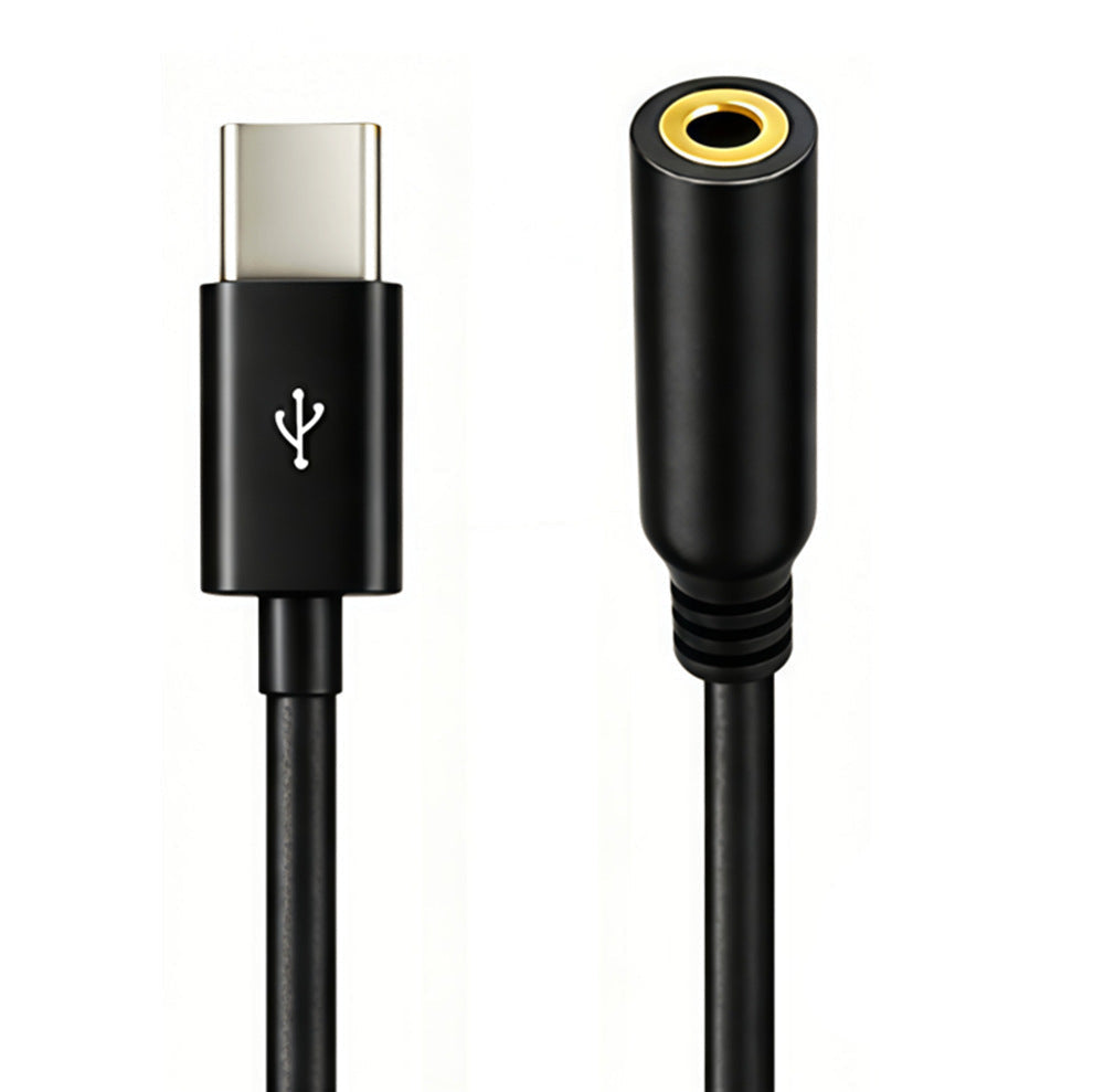 Close-up of USB-C male and 3.5mm 3-pole female stereo audio connectors
