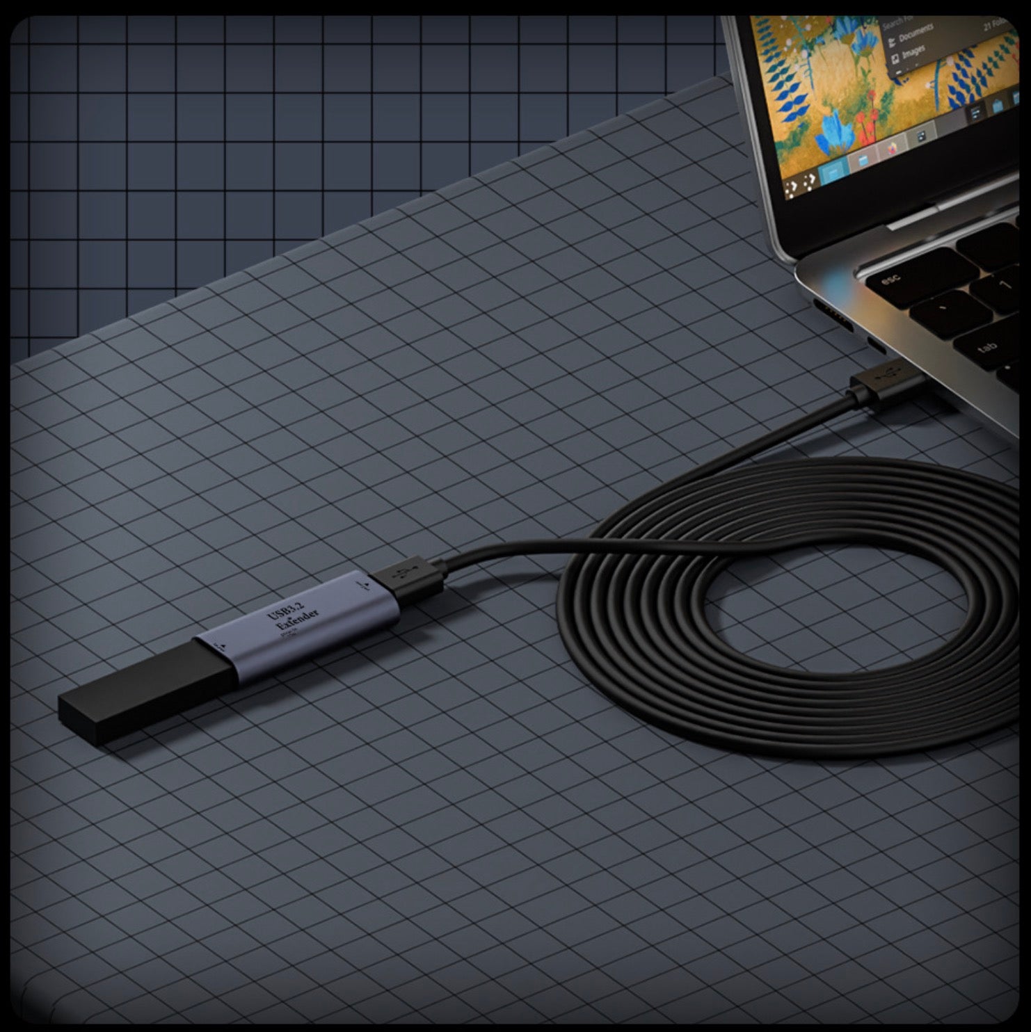USB active repeater adapter connected in a desktop computer workspace
