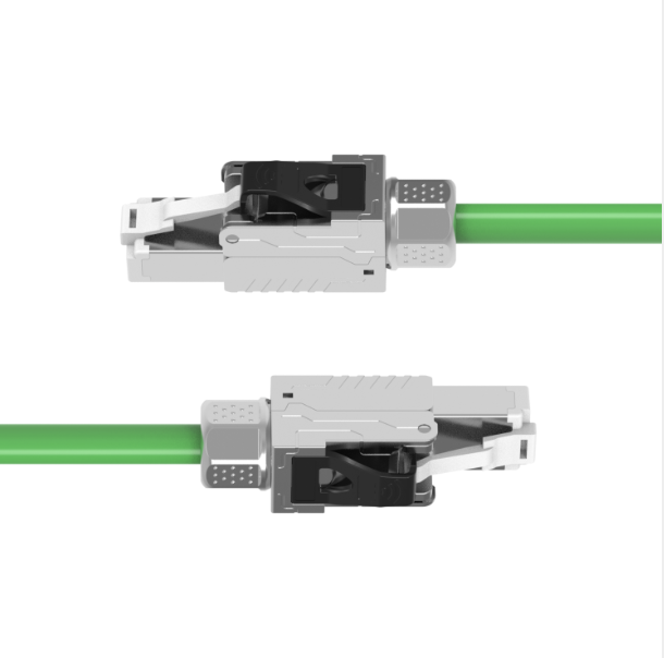 Two cable connectors with green cables on a white background