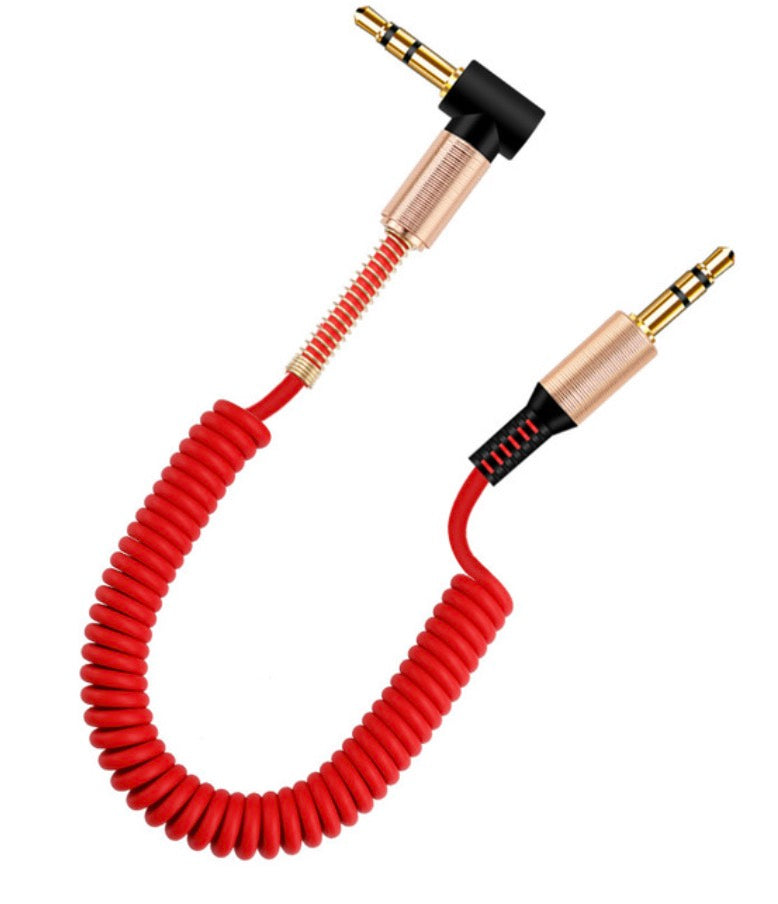 An orange coiled 3.5mm male to male audio cable with gold-plated connectors.