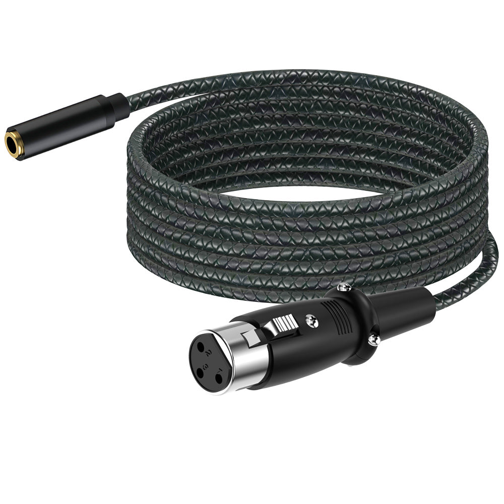 Coiled audio cable with XLR connector on a white background