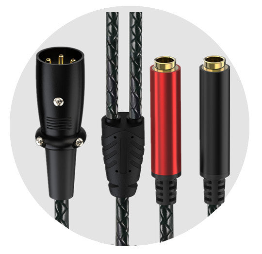 A close-up of a braided black cable showing three connector ends: a black 3-pin plug on the left, a red-and-black ring connector with a gold-toned inner contact in the middle, and a black ring connector with a gold-toned inner contact on the right, set against a light gray circular background.