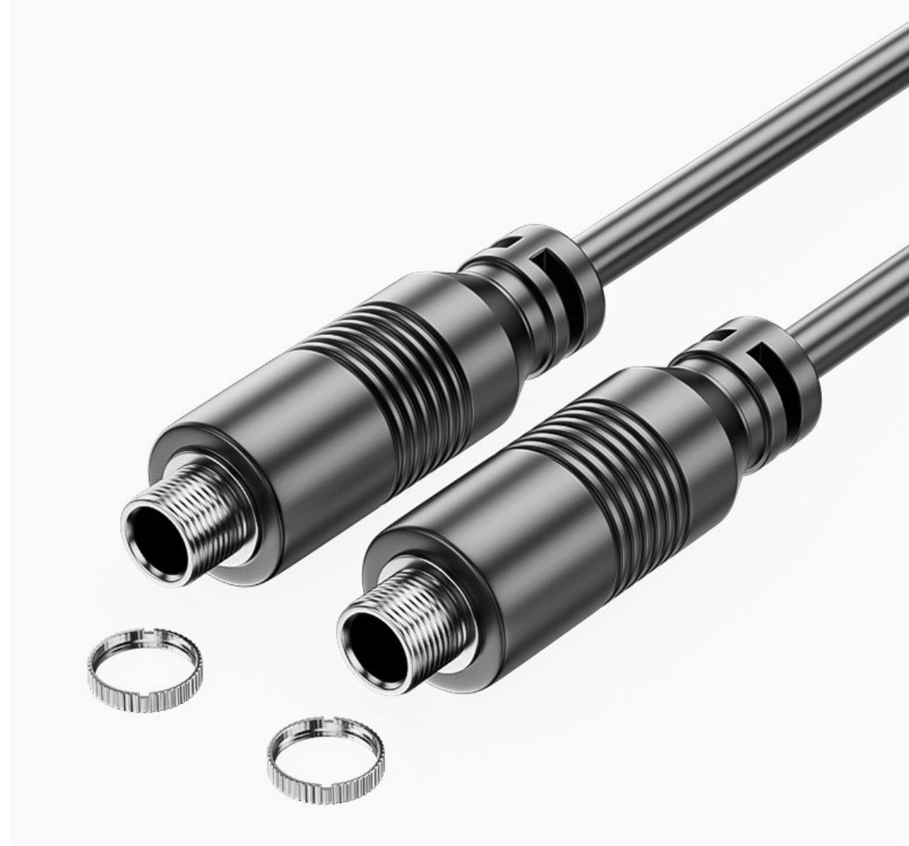 The image shows a black 3.5mm stereo audio extension cable with female to female connectors, along with two small metal rings for panel mounting.