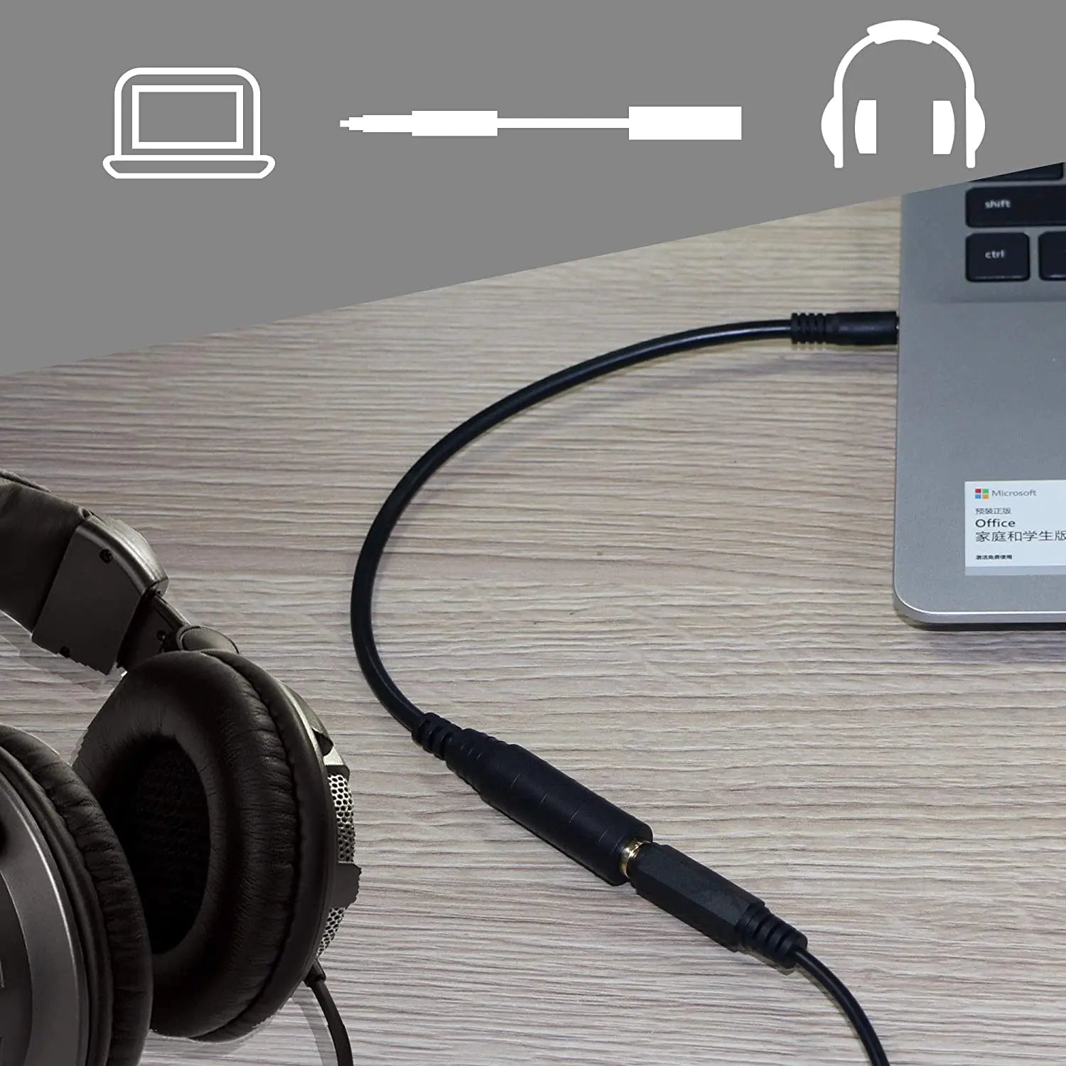 Headphones connected to a computer with icons of a laptop, cable, and headphones on a gray background.
