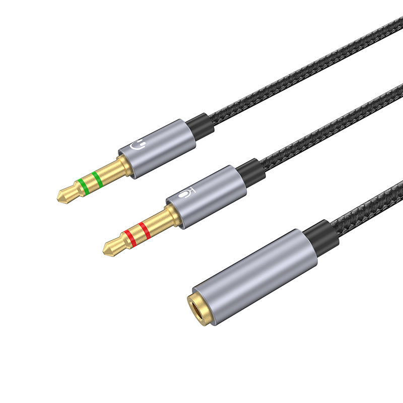 Three audio cables with gold connectors on a white background