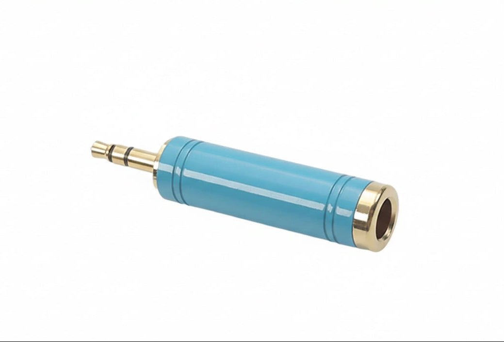 Two blue audio connectors with gold ends on a white background