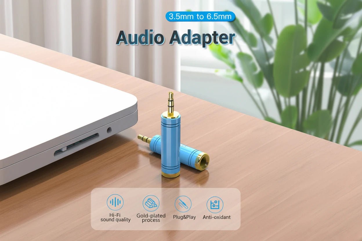 Blue audio adapter on a desk with a laptop, plant, and curtain in the background