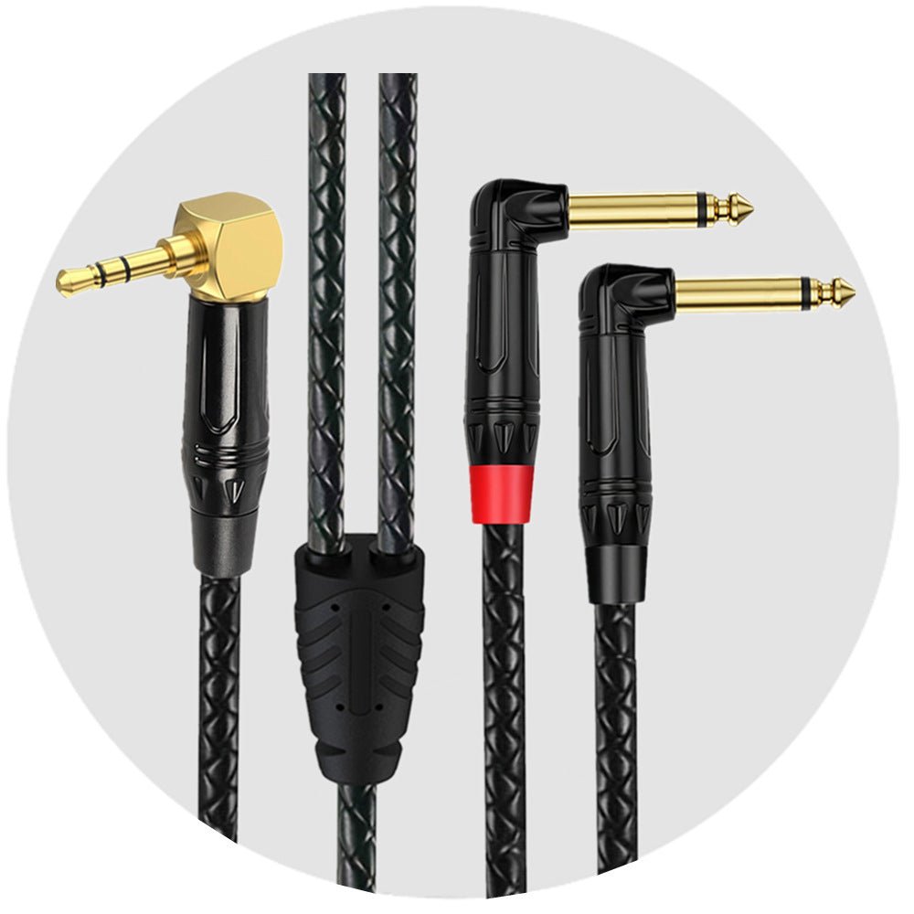 Four audio cables with different connectors on a white background