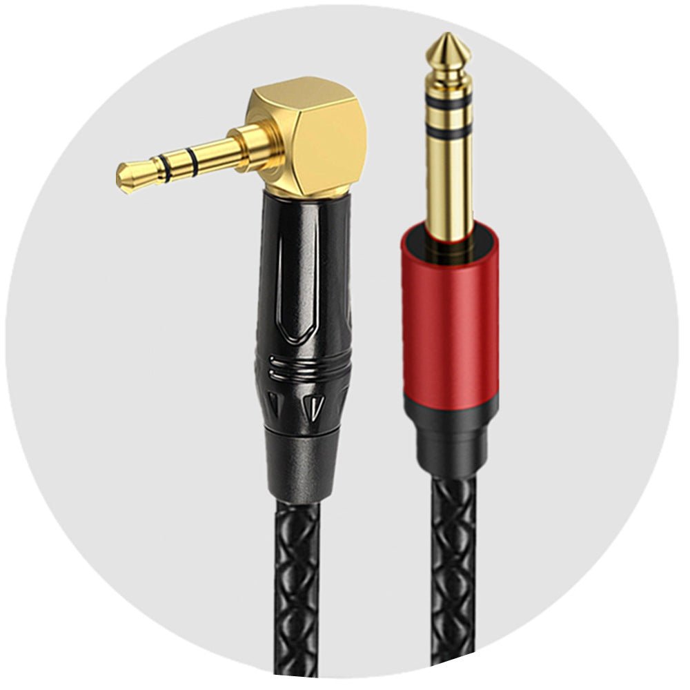 Audio cable with gold and red connectors on a white background