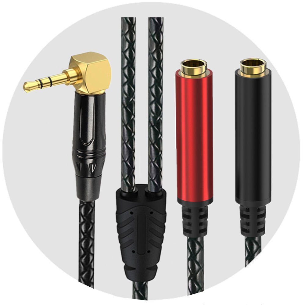 Set of audio cables with gold connectors on a white background