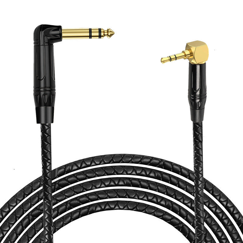 Black braided audio cable with gold connectors on a white background