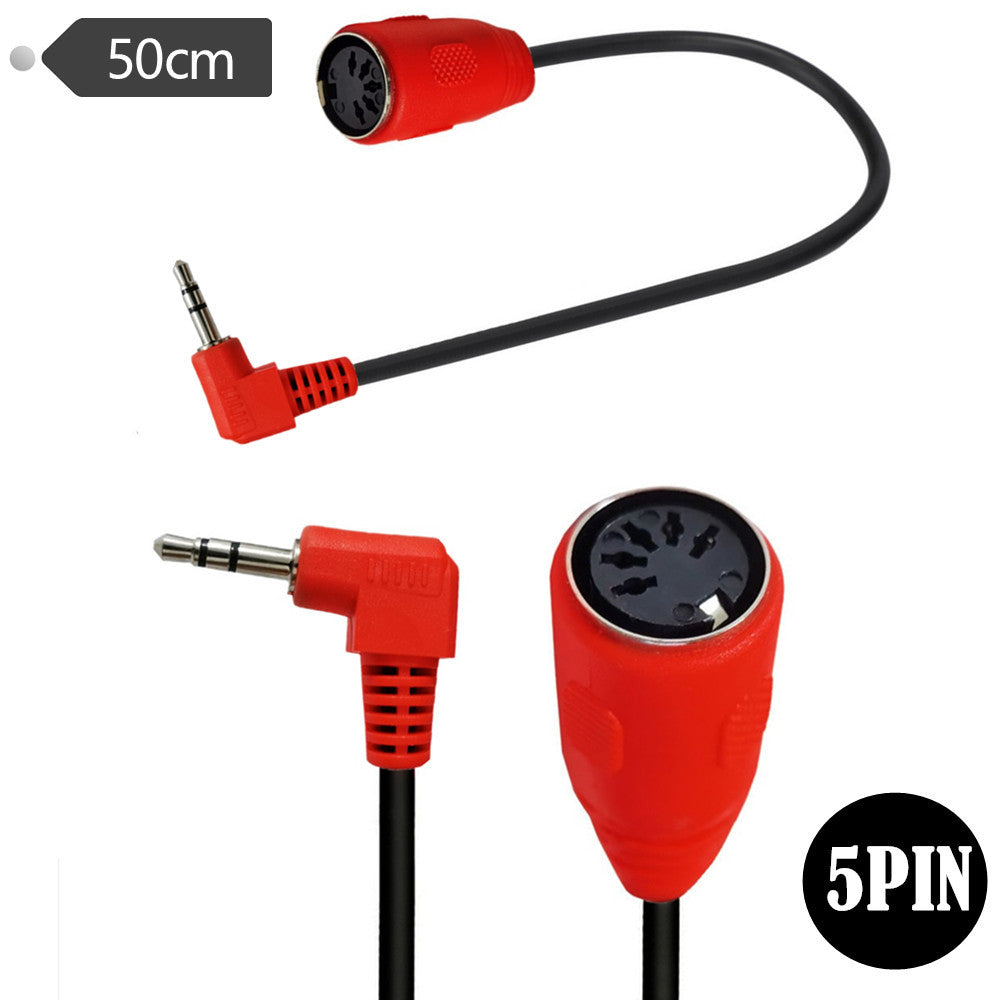 3.5mm TRS Type B to 5-pin DIN female MIDI adapter connected between a MIDI interface and synthesizer