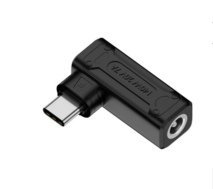 A black angled male USB-C to 5.5 x 2.5mm DC laptop power plug charging adapter.