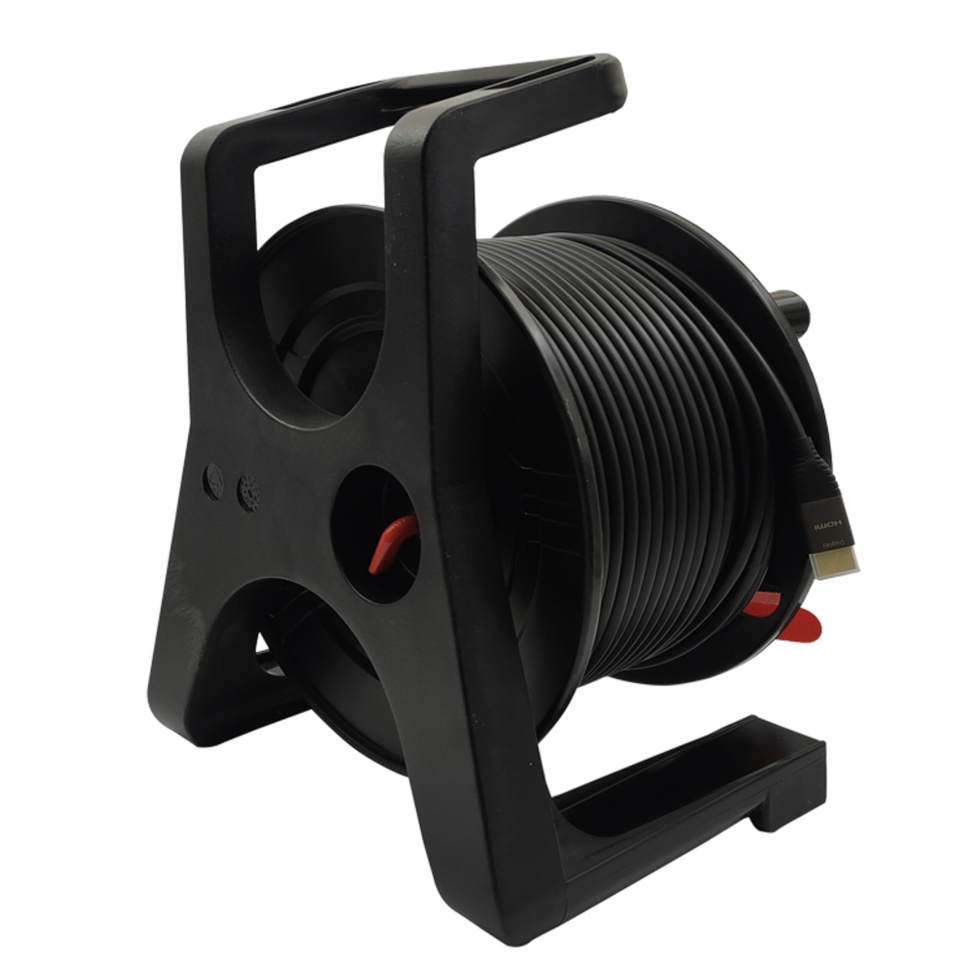 Black cable reel with cable on a white background