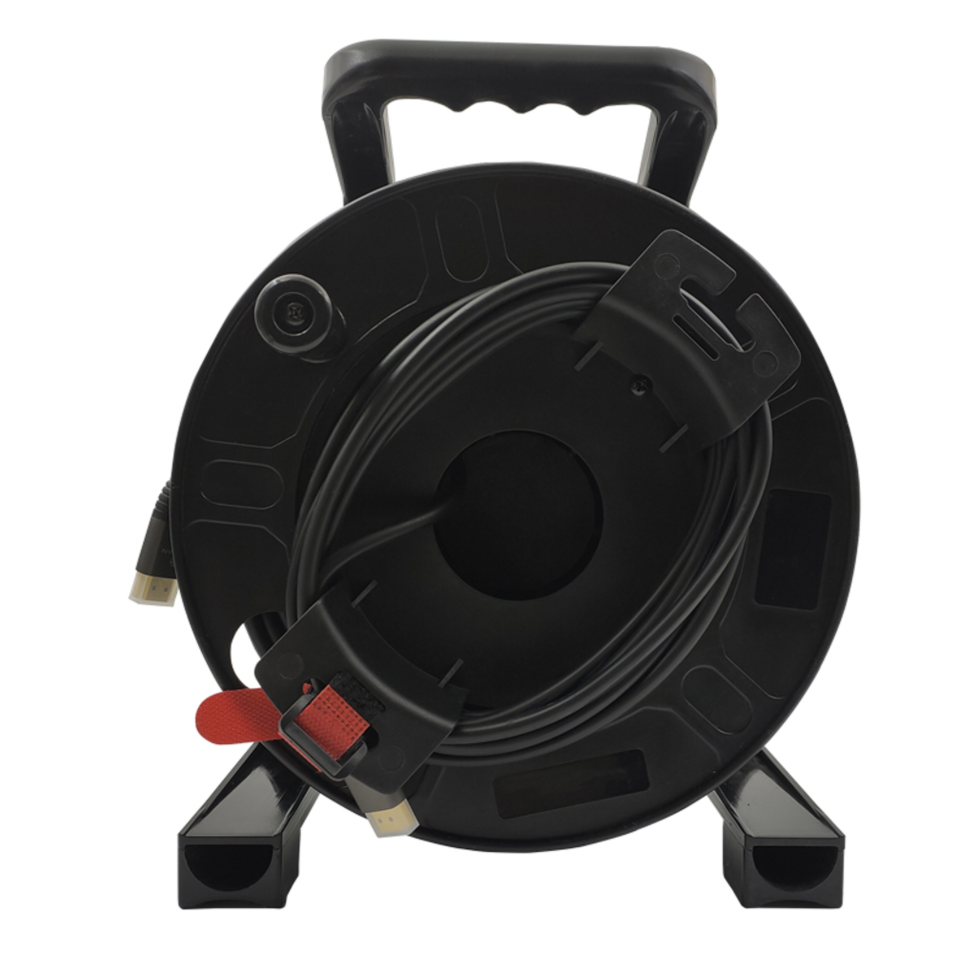 Black retractable cable reel on a white background