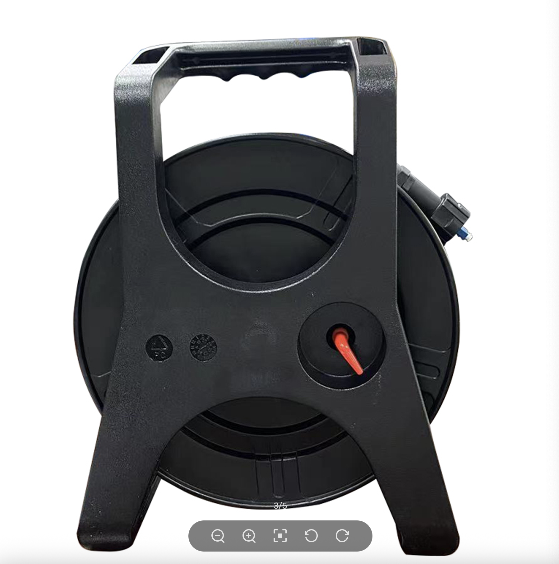 Black reel with handle on a white background