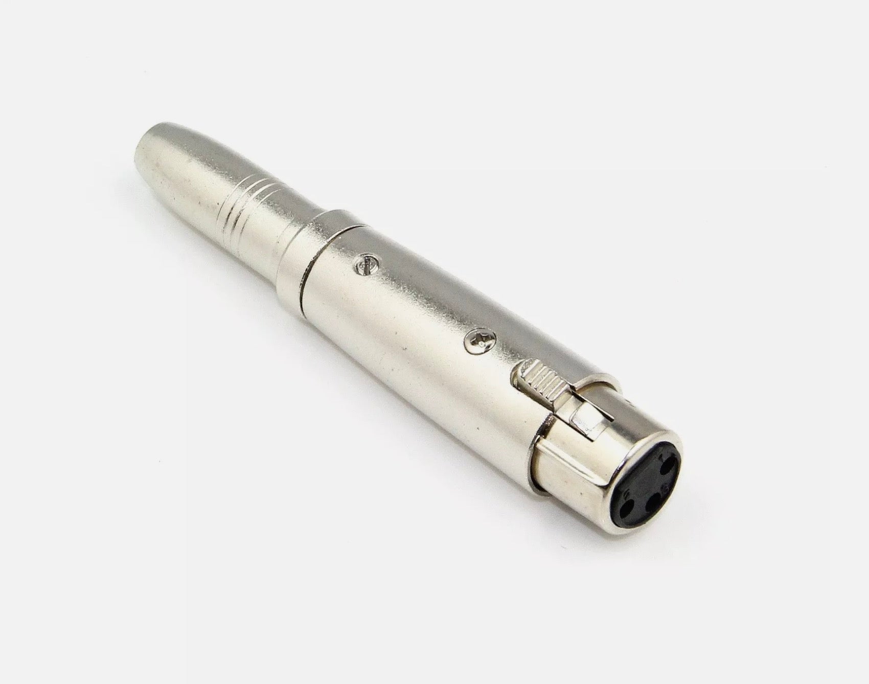 Metallic audio connector on a white background