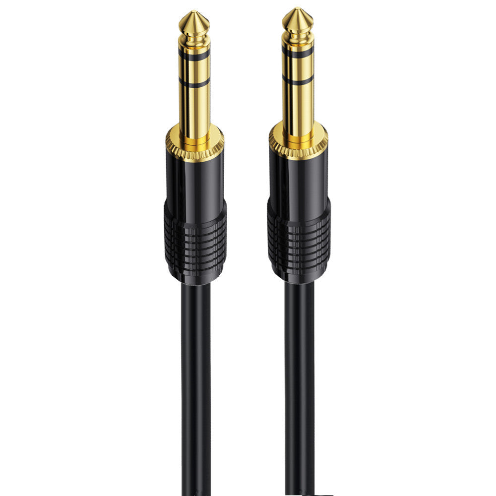 A black 6.35mm TRS stereo audio interconnect cord with 1/4 inch male connectors and double nylon braid shielding.