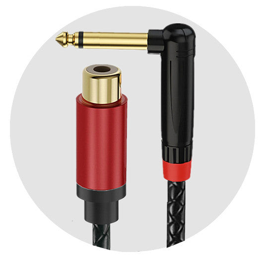 Audio cable with red and gold connector on a white background