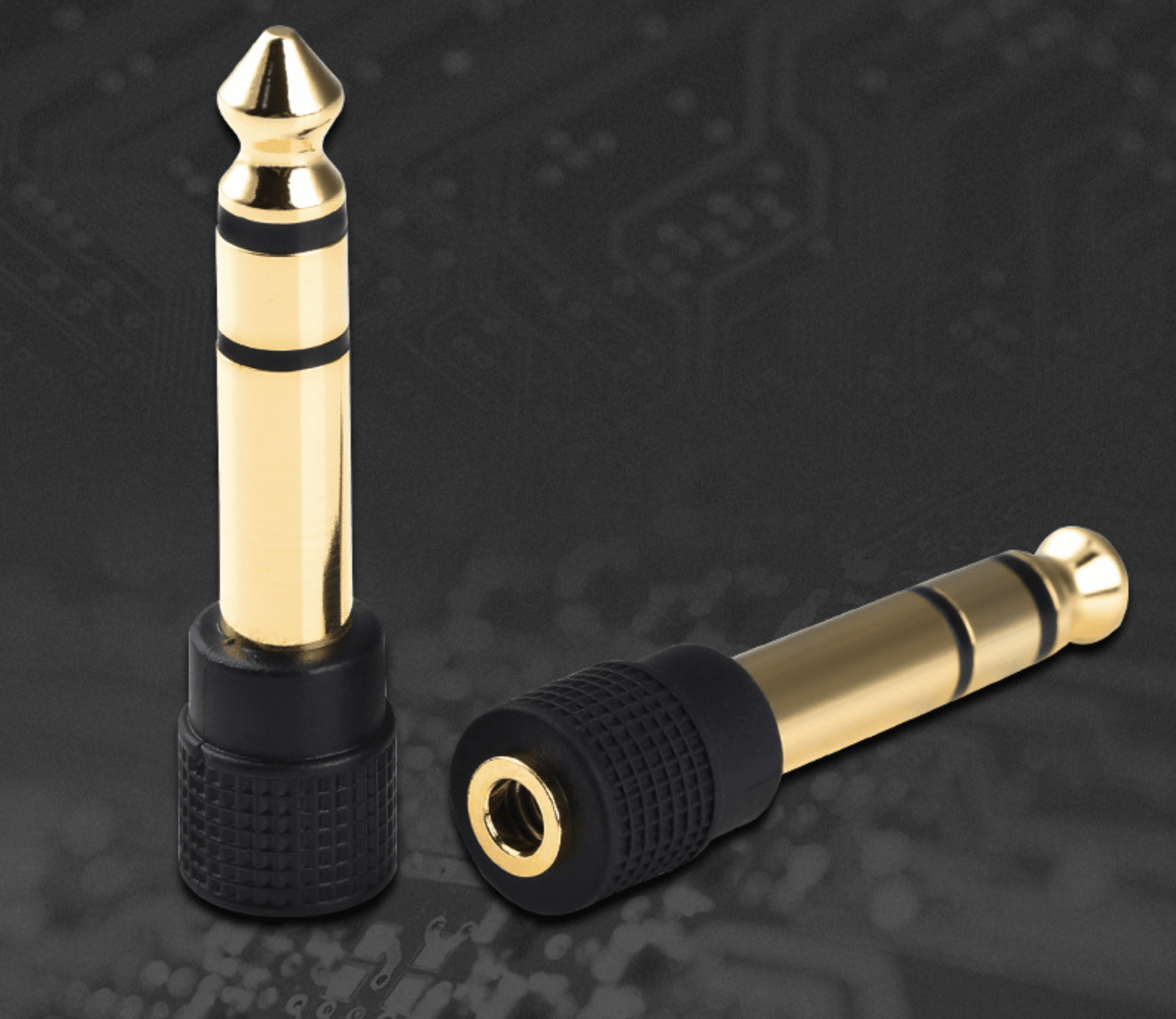 Gold and black audio plug on a dark background