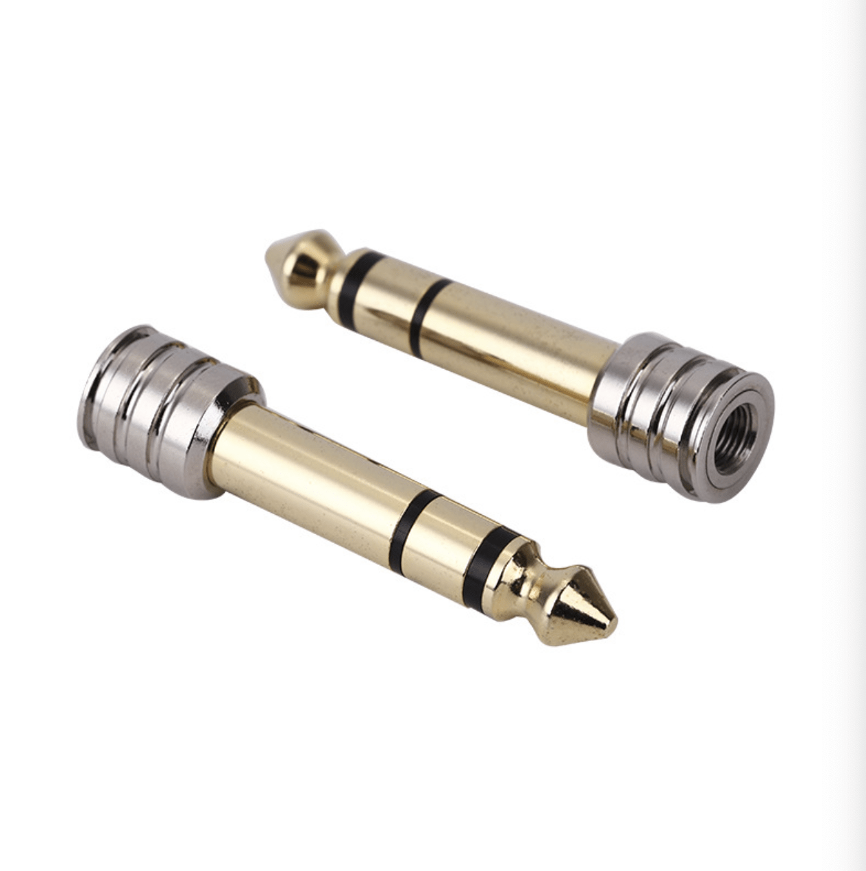 Two gold and silver audio connectors on a white background