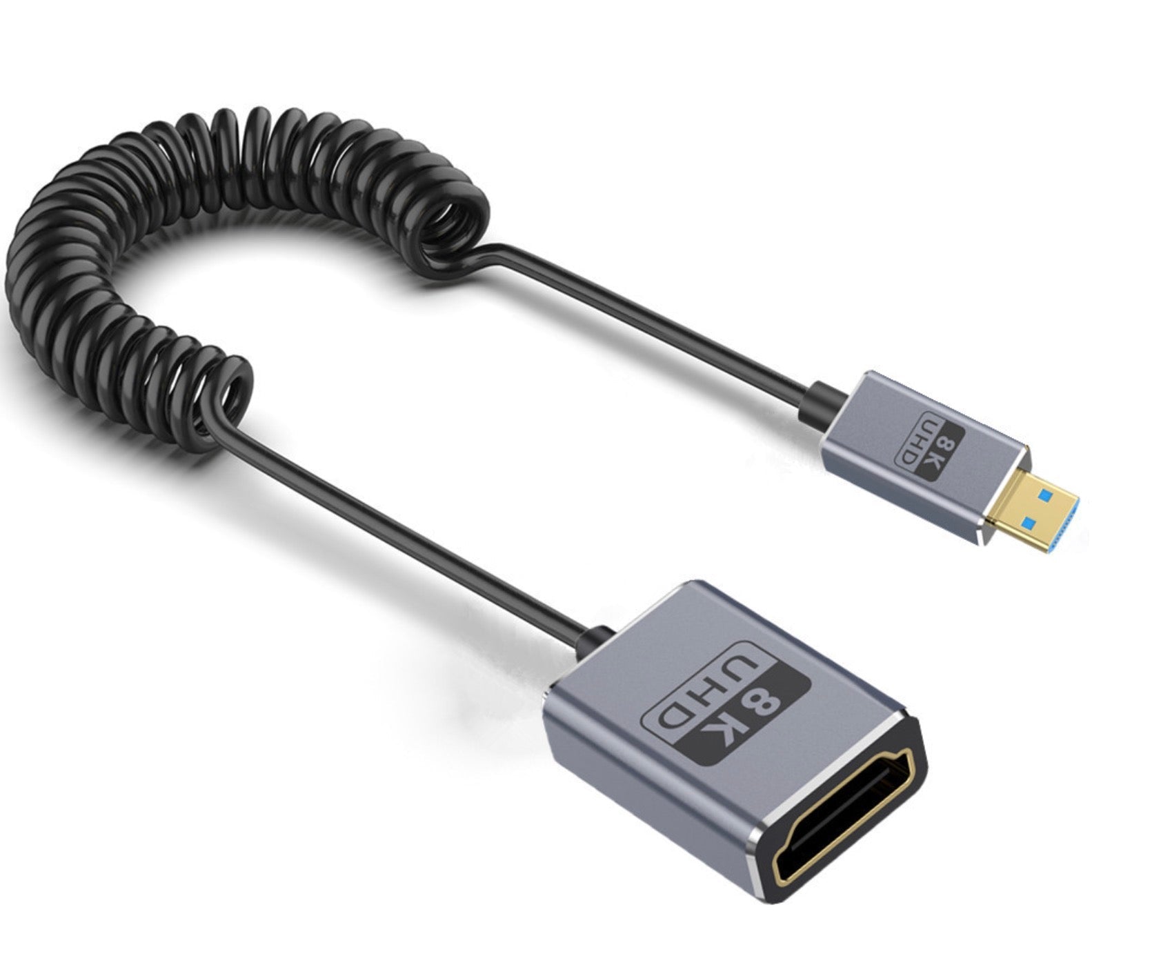 A black coiled micro HDMI to HDMI cable with a micro HDMI connector on one end and an HDMI connector on the other.