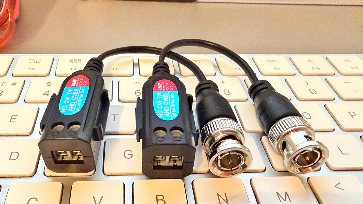 8MP CCTV video balun pair with BNC male connectors and 2-wire terminal