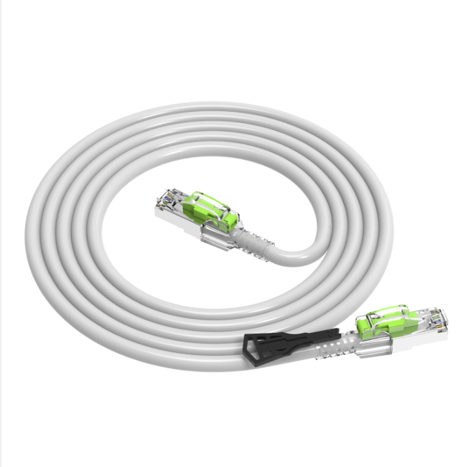 White Ethernet cable with green connectors on a white background
