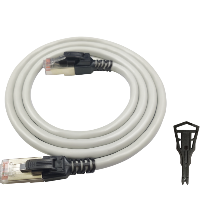 Coiled Ethernet cable with connectors on a white background