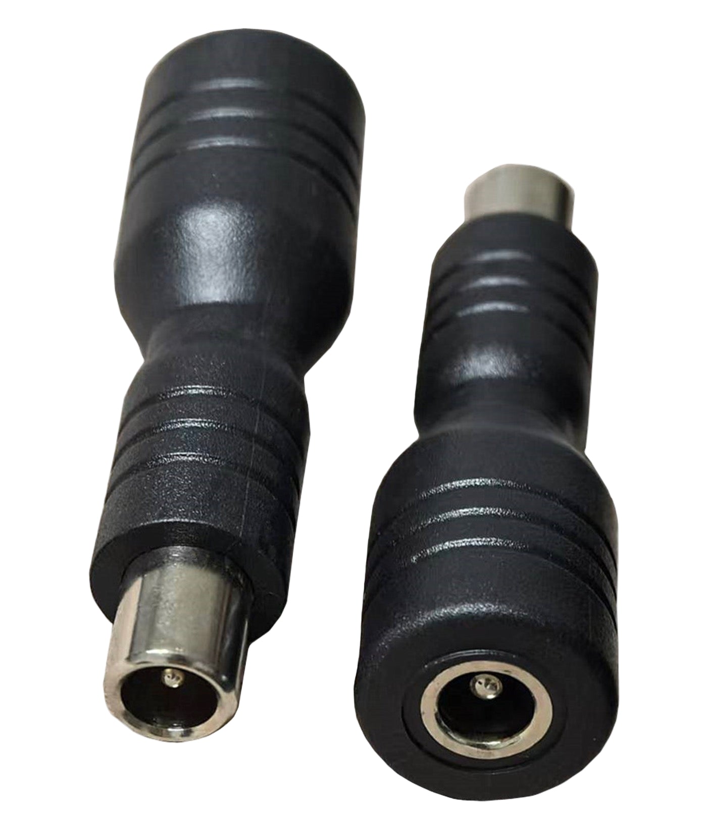 Two black audio/video connectors on a white background