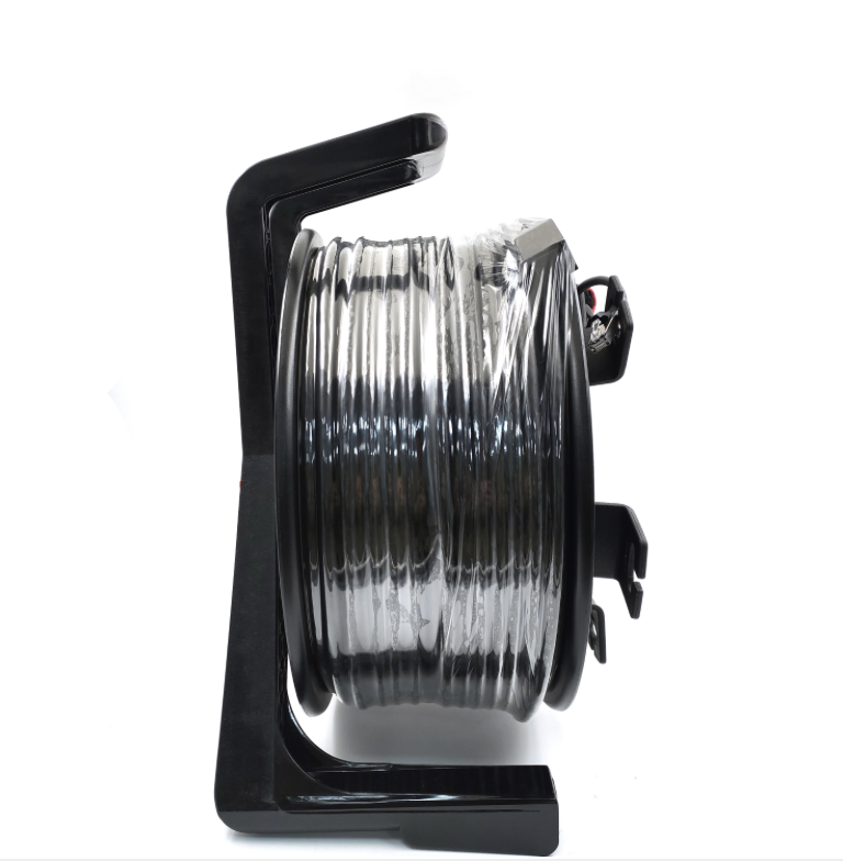 Black wire reel with clear wire on a white background