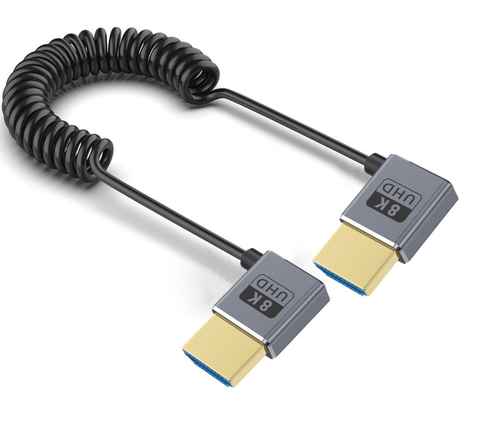 An ultra thin, coiled coaxial HDMI cable with a black inner cable and gray connectors on both ends.