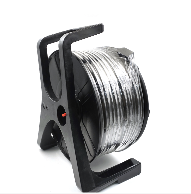 Black wire reel with clear wire on a white background