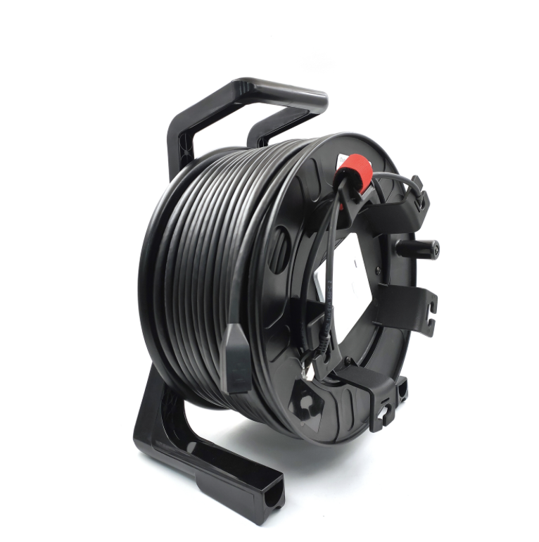 Black wire reel with handle on a white background