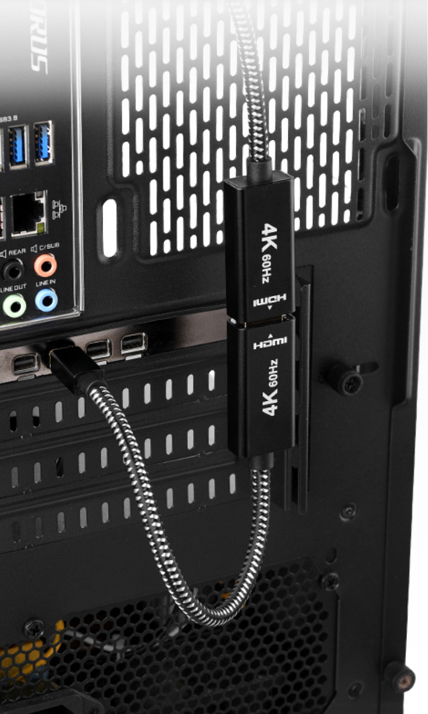 Back view of a computer case with USB ports and a cable attached.