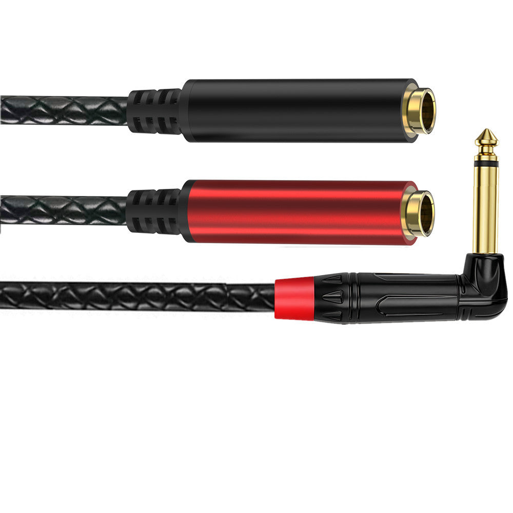 Audio cable with black and red connectors on a white background