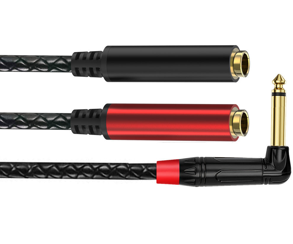 Audio cable with black and red connectors on a white background