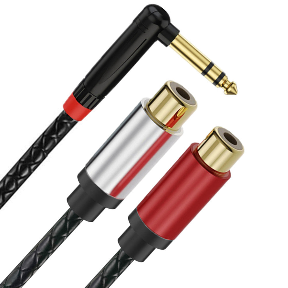 Audio cable with RCA and 1/4 inch plug on a white background